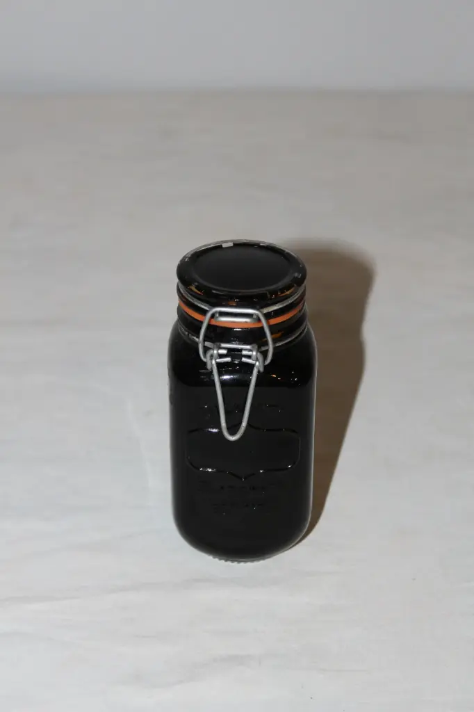 Jar of Black Liquid